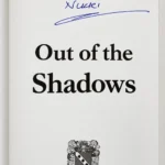 Handwritten “With love & light” dedication and signature by Nikki Laycy on the inside title page of Out of the Shadows.